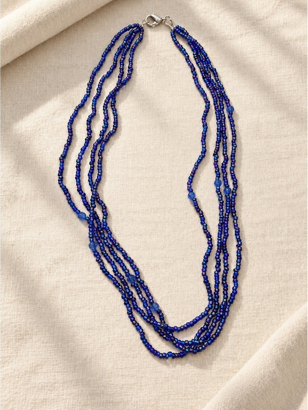 Blue Iridescent 4-Strand Beaded Necklace with Purple Shimmer